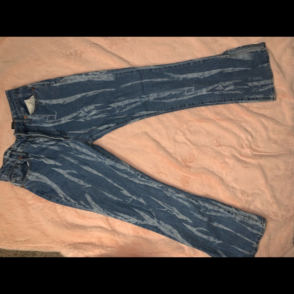 Striped light and white jeans flare out very comfortable only worn once